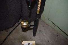 7 various sized fishing poles with reels and string