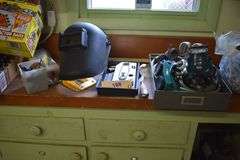 hand tools, contractor bags, welding goggles, sprayer, buckets, chain