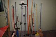 Various implements, axes, maul, sledge hammer, rakes, clamps, crow bar, machete, bowie knife, etc.