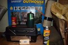 Camper top tent, bait box, fish light, tackle box, flow troll, waders, insect repellant, outhouse pack in blind