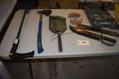 Various implements, axes, maul, sledge hammer, rakes, clamps, crow bar, machete, bowie knife, etc.