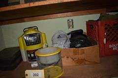 Camper top tent, bait box, fish light, tackle box, flow troll, waders, insect repellant, outhouse pack in blind