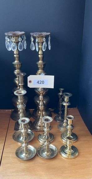 Brass Candlesticks, 13 Pieces image