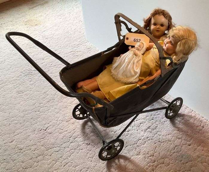 Two Antique Dolls In Antique Buggy Missing Hood Cover image