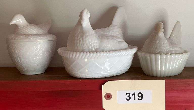 Three Glass Hens On Nest image