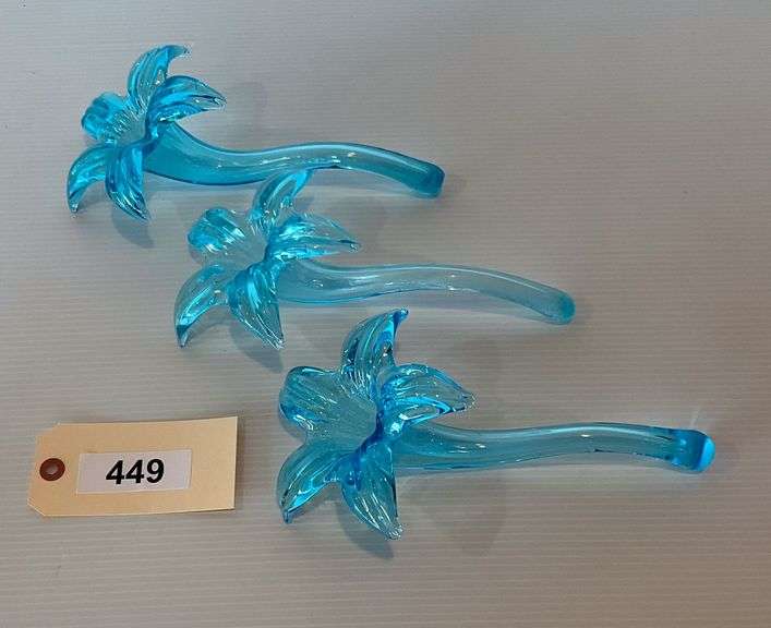 Three Light Blue Glass Flowers image