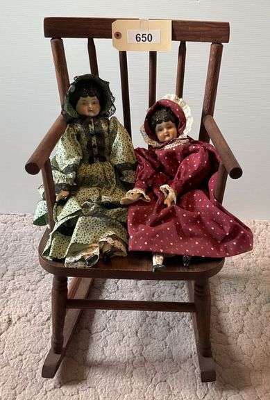 Two Porcelain Dolls In Victorian Clothing And Wooden Rocker image