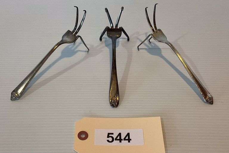 Three Silverplate Forks Made Into Easels image
