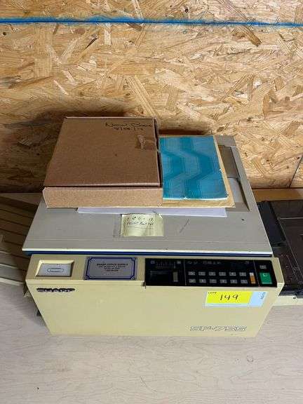 Sharp Printer & Electronics + paper under table