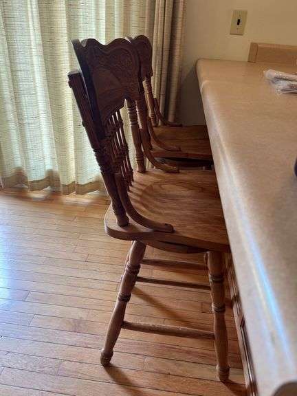 2 Solid Oak Pressed Back Swivel Barstools- 3'4" to seat bottom, 2' seat height
