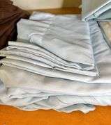 Shelf of Household Linens- Browns, Blues & White
