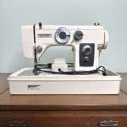 Vintage Montgomery Ward Good Housekeeper Sewing Machine with cover for easy storage