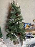 Assorted Christmas Decor- 1/2 of contents of table