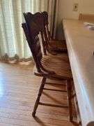 2 Solid Oak Pressed Back Swivel Barstools- 3'4" to seat bottom, 2' seat height