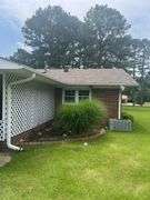 Solid Brick Home on 1.29 +/- Acres, Screened Porch, Workshop, Tree-lined Drive & Outbuildings