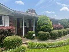 Solid Brick Home on 1.29 +/- Acres, Screened Porch, Workshop, Tree-lined Drive & Outbuildings