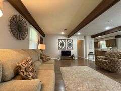 Solid Brick Home on 1.29 +/- Acres, Screened Porch, Workshop, Tree-lined Drive & Outbuildings