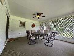 Solid Brick Home on 1.29 +/- Acres, Screened Porch, Workshop, Tree-lined Drive & Outbuildings