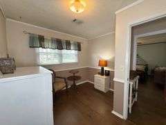 Solid Brick Home on 1.29 +/- Acres, Screened Porch, Workshop, Tree-lined Drive & Outbuildings