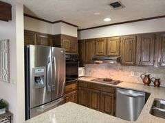 Solid Brick Home on 1.29 +/- Acres, Screened Porch, Workshop, Tree-lined Drive & Outbuildings