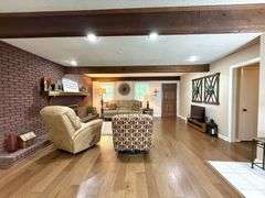 Solid Brick Home on 1.29 +/- Acres, Screened Porch, Workshop, Tree-lined Drive & Outbuildings