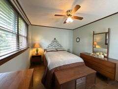 Solid Brick Home on 1.29 +/- Acres, Screened Porch, Workshop, Tree-lined Drive & Outbuildings