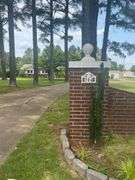 Solid Brick Home on 1.29 +/- Acres, Screened Porch, Workshop, Tree-lined Drive & Outbuildings