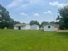 Solid Brick Home on 1.29 +/- Acres, Screened Porch, Workshop, Tree-lined Drive & Outbuildings