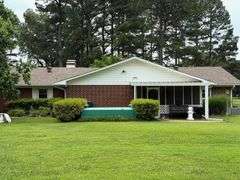 Solid Brick Home on 1.29 +/- Acres, Screened Porch, Workshop, Tree-lined Drive & Outbuildings