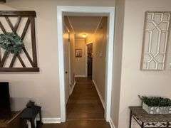 Solid Brick Home on 1.29 +/- Acres, Screened Porch, Workshop, Tree-lined Drive & Outbuildings
