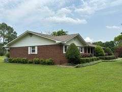 Solid Brick Home on 1.29 +/- Acres, Screened Porch, Workshop, Tree-lined Drive & Outbuildings