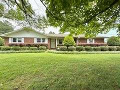 Solid Brick Home on 1.29 +/- Acres, Screened Porch, Workshop, Tree-lined Drive & Outbuildings