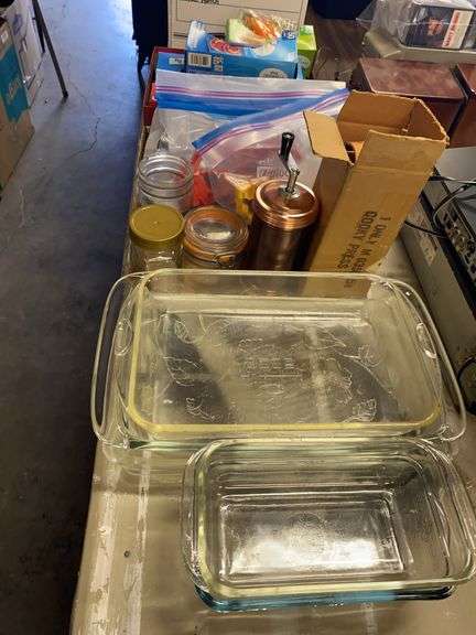 Glass baking dishes, cookie cutters and press, muffin tins, baggies image