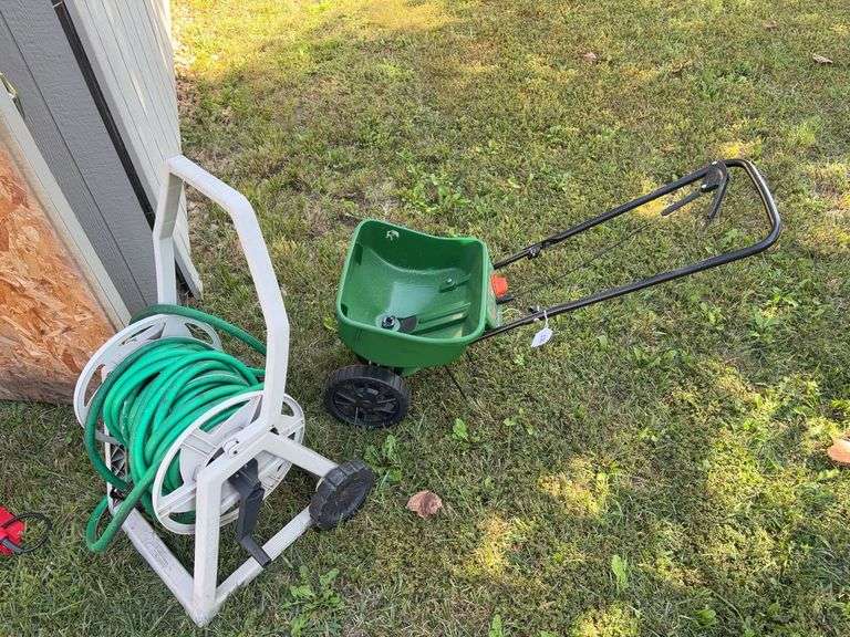 Scott’s lawn seeder, garden hose on reel image