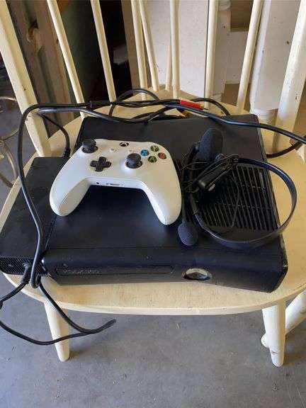XBOX 360 with headset and controller image