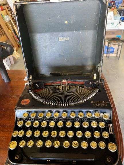 Vintage Remington portable typewriter in case image