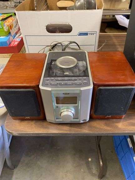 Compact JVC stereo with speakers, cassette tapes image