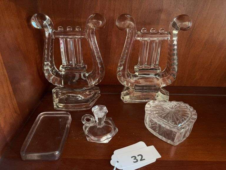 Pair of Fostoria crystal lyre bookends, covered heart dish, mini candleholder, glass paperweight image