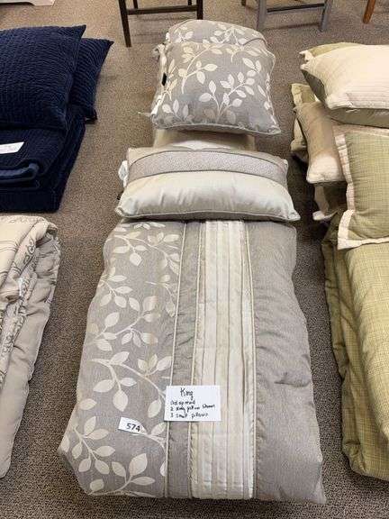 King size bedspread, two king pillow shams, three small pillows image