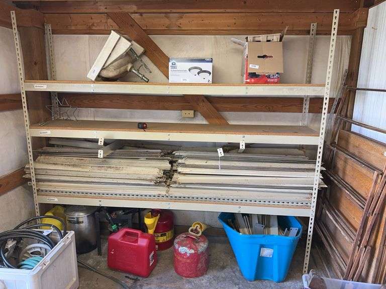 Large lot of industrial metal shelving - excludes one assembled image