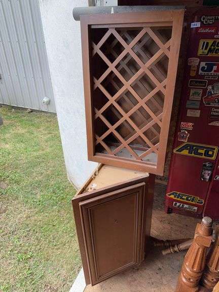 2 cabinets: 1 - 12” slanted front base cabinet and 1 - 18x30x12” wine bottle cabinet image