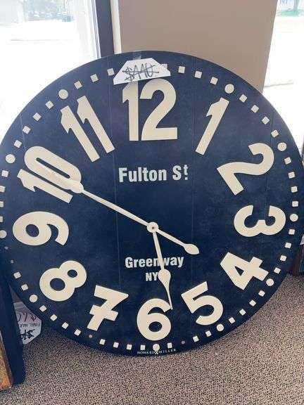 ROUND METAL CLOCK AND LARGE ROUND WOODEN CLOCK image