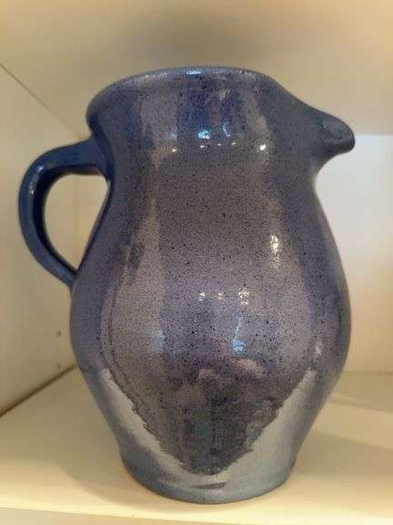 Blue pottery pitcher image