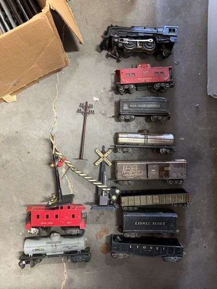 Lionel Scott train set and with assorted track, controllers, rail cars and misc image