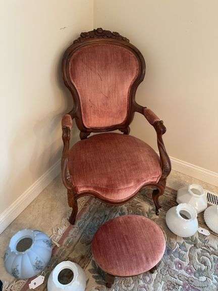 Victorian carved chair and ottoman with rose velvet fabric image