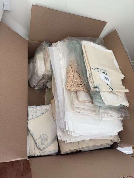 Box of vintage linen table cloths placemats and napkins image