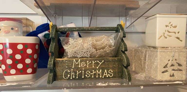 Christmas decorations, coffee mugs, votive holders image