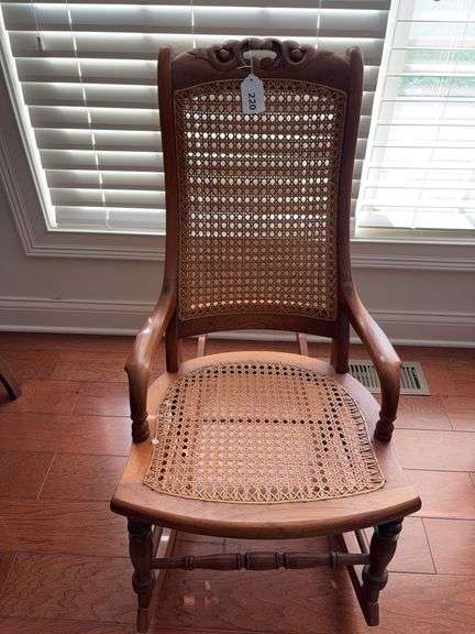 Antique caned rocker image
