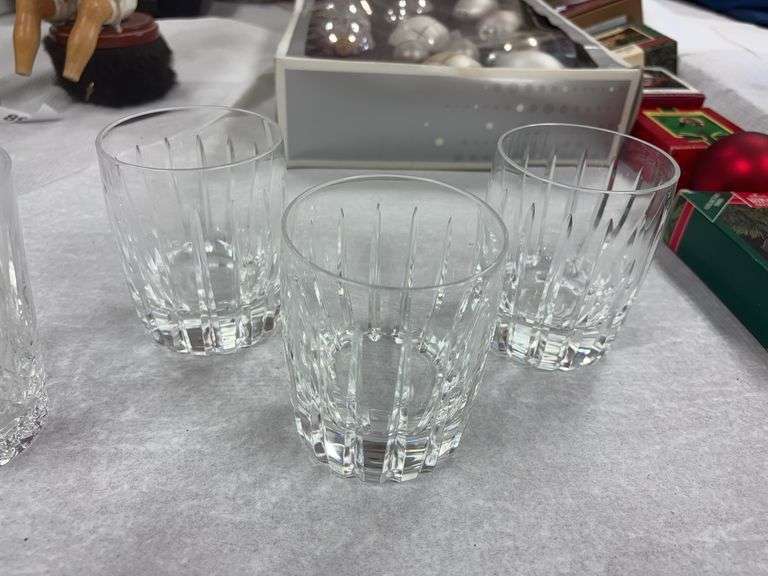 4 tumblers :  3 are by Lenox that match and one is by Godinger and Christmas ornaments image
