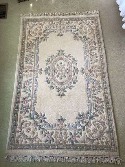 Thick hand-tuffed 42” x 70” rug image